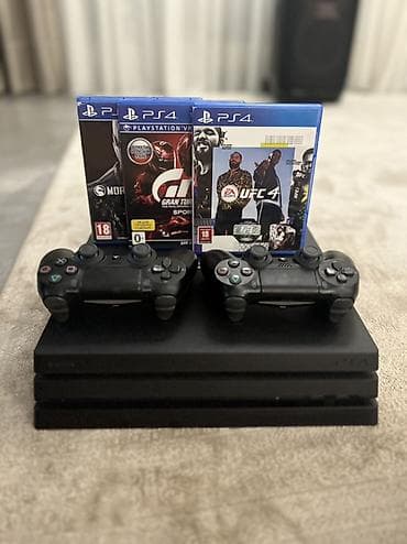 4 x: PlayStation 4 Pro (PS4 Pro) + 2 геймпада DualShock 4 + 3 диска Состав — 1