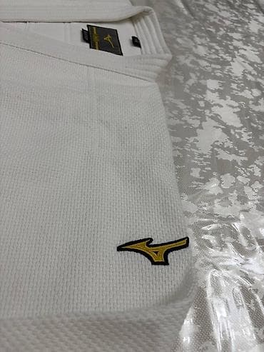 Спорт и отдых: Mizuno белое в идеальном состоянии продаю по срочной цене так как — 4