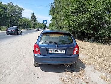 rd 1: Mazda 323: 2003 г., 1.6 л, Механика, Бензин, Универсал — 6