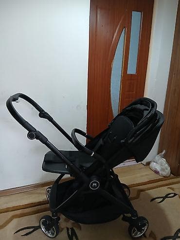 doona x: Прогулочная коляска Inno Baby (надпись на подножке) в универсальном — 4