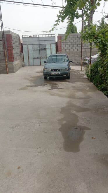 дом на колосах: Daewoo Nexia: 2004 г., 1.5 л, Механика, Бензин, Седан — 6