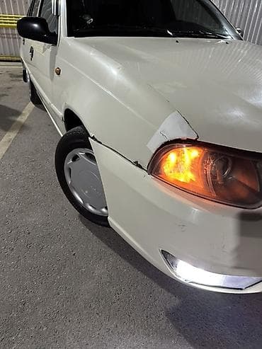 Daewoo Nexia: 2012 г., 1.5 л, Механика, Газ, Седан — 6