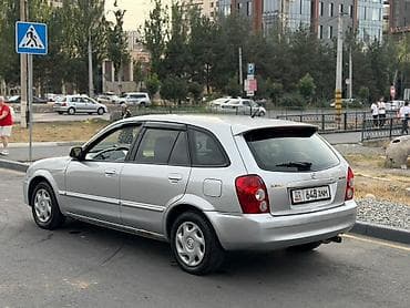 launch 431: Mazda 323: 2003 г., 1.6 л, Механика, Бензин, Универсал — 3