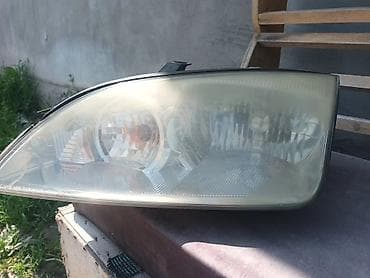 Автозапчасти: Передняя левая фара Ford 2005 г., Б/у, Оригинал, США — 2