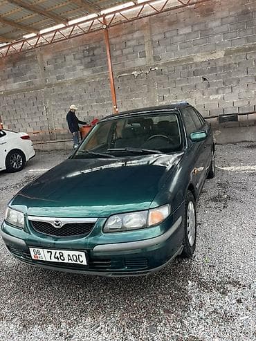 Mazda 626: 1997 г., 1.8 л, Механика, Бензин, Седан