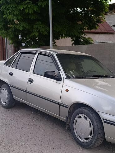 Daewoo Nexia: 2007 г., Бензин, Седан — 5