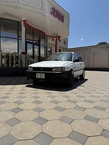 Унаа: Toyota Starlet: 1991 г., 1.3 л, Кол менен иштөөчү, Бензин, Хетчбек — 2