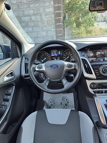 Ford Focus: 2013 г., 1.6 л, Бензин, Хетчбек — 9
