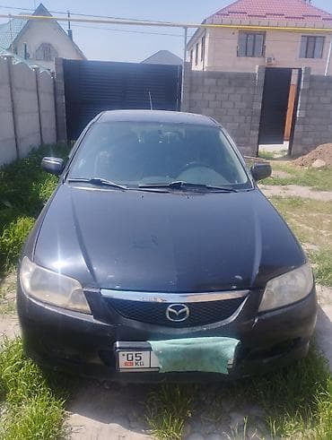 mazda 324: Mazda 323: 2002 г., 1.6 л, Механика, Бензин, Хэтчбэк — 1