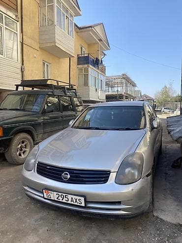 mazda 323 2003: Nissan Skyline: 2003 г., Автомат, Седан — 2