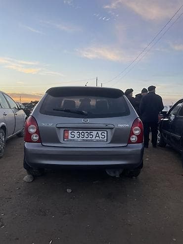 mazda 323 2003: Mazda 323: 2003 г., 1.6 л, Механика, Бензин, Хэтчбэк — 2