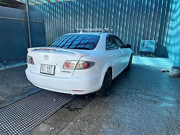 mazda 623: Mazda 6: 2003 г., Седан — 7