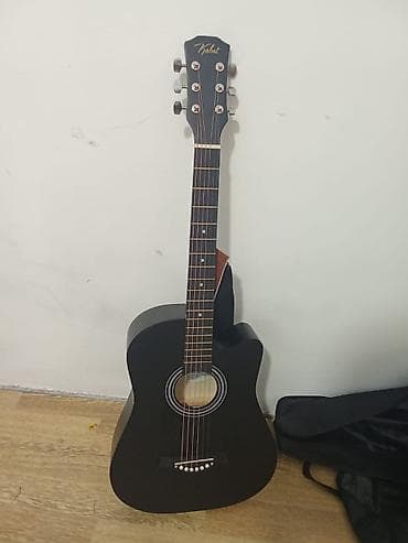 Гитары: Ассаламу алейкум срочно продаю гитару за 2500 сом новый — 2