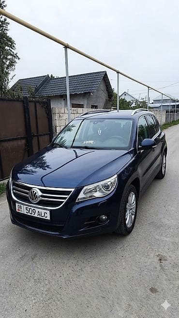 катафоты: Volkswagen Tiguan: 2011 г., 2 л, Автомат, Бензин, Кроссовер — 1