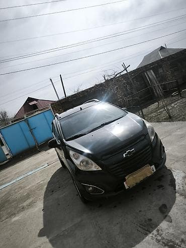 шевролет траккер: Chevrolet Spark: 2012 г., Хэтчбэк — 6