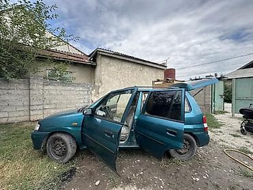 Продажа авто: Mazda Demio: 1999 г., 1.3 л, Механика, Хэтчбэк — 5