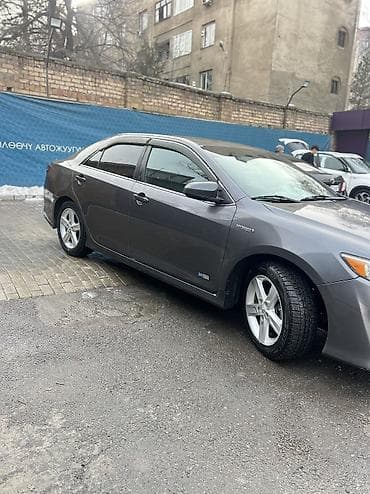 селика: Toyota Camry: 2014 г., 2.5 л, Автомат, Гибрид, Седан — 2