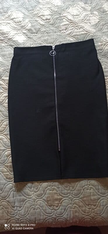 теннисный юбка: Новая юбка почти не носили размер (L) 46. Длинна по колена — 1