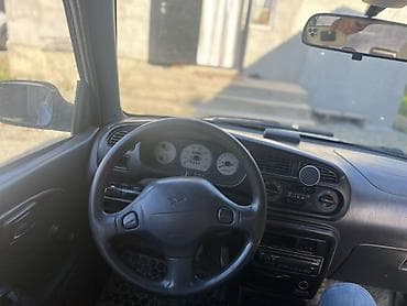 зеркало большие: Daihatsu Cuore: 2002 г., 1 л, Механика, Бензин, Хэтчбэк — 8