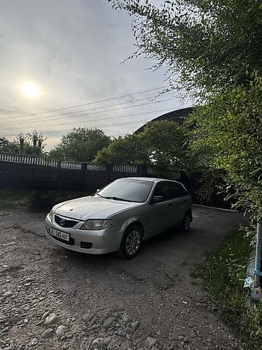пасат бы 3: Mazda Familia: 2002 г., 1.3 л, Бензин, Универсал — 2