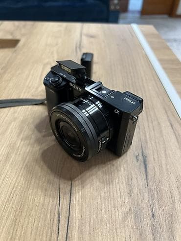 Видеокамеры: Беззеркальная камера Sony Alpha a6000 с объективом E PZ 16–50mm — 3