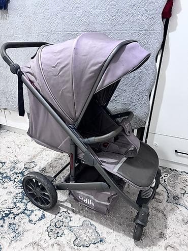 шорты ниже колен: Прогулочная коляска Kidilo, универсальная для города и парка — 2