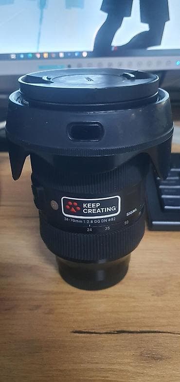 объектив 50мм: Объектив для sony SIGMA 24-70mm f/2.8 DG DN (Ø82) — универсальный — 2