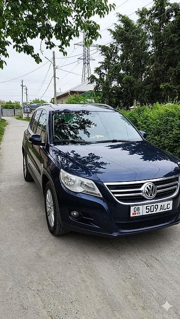 катафоты: Volkswagen Tiguan: 2011 г., 2 л, Автомат, Бензин, Кроссовер — 2