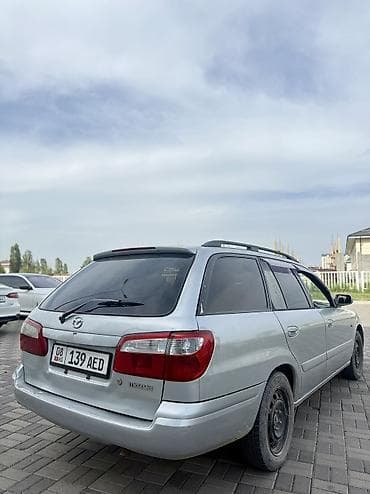мазда фамиля: Mazda 626: 2002 г., 1.8 л, Автомат, Бензин, Универсал — 3