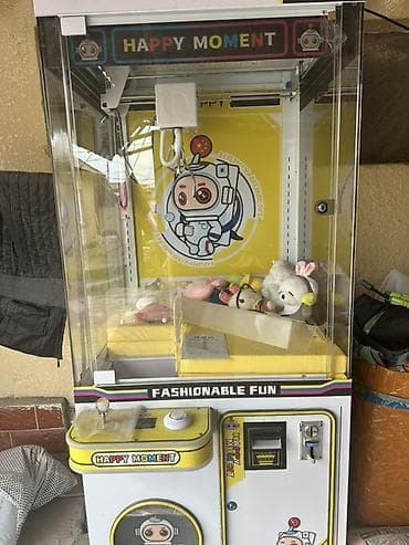 magic box: Игровой автомат 'Хватайка' с ярким дизайном, выполненный в белом и — 3