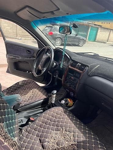 диски на 4runner 215: Mazda 626: 1997 г., 1.8 л, Ручные, Бензин, Седан — 6