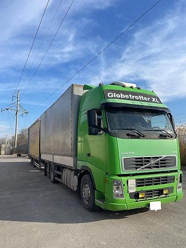 срочно продаю прицеп шторка: Тягач, Volvo, 2002 г., Тентованный — 2