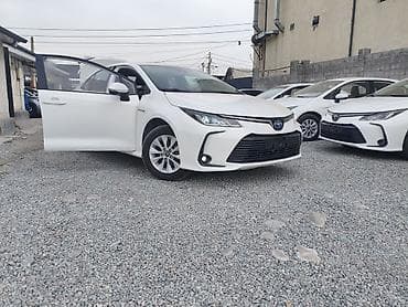 Toyota Corolla: 2022 г., 1.8 л, Вариатор, Гибрид, Седан