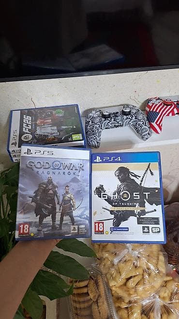 Игровые диски для PlayStation: - God of War Ragnarök (PS5) •