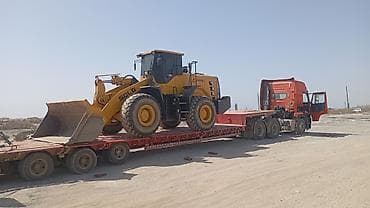 бетономешал: Негабаритные и тяжеловесные автоперевозки спецтехники на низкорамных — 3