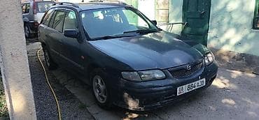 Продажа авто: Mazda Familia: 1999 г., 1.5 л, Механика, Бензин, Универсал — 2