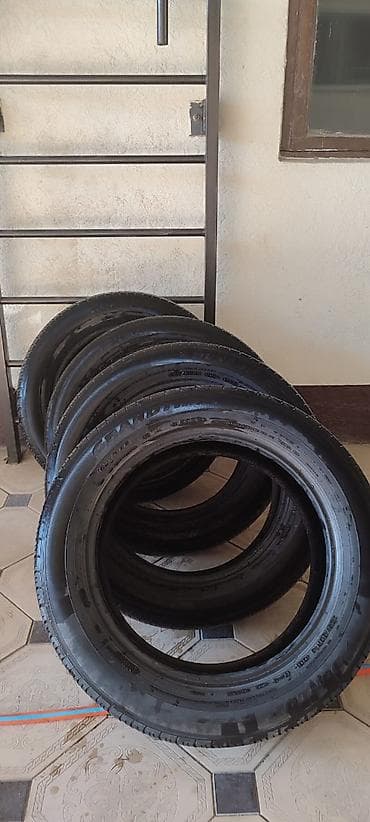 шины 22560 r18: Комплект из 4 автомобильных шин Dunlop. Характеристики: - Размер — 4