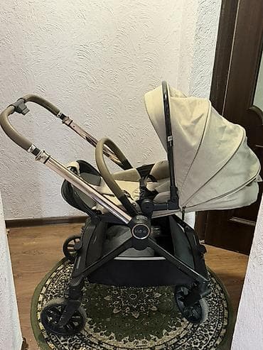 Коляски: Прогулочная коляска Kidilo) в бежевом цвете. Основные особенности: - — 3
