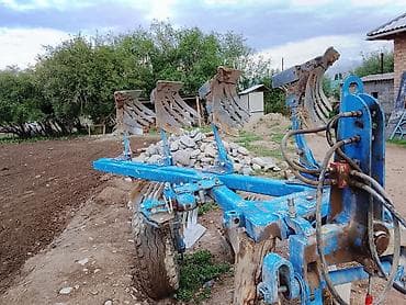 Унаа: Навесной оборотный плуг, 4-корпусный Описание: - Полевой оборотный — 1
