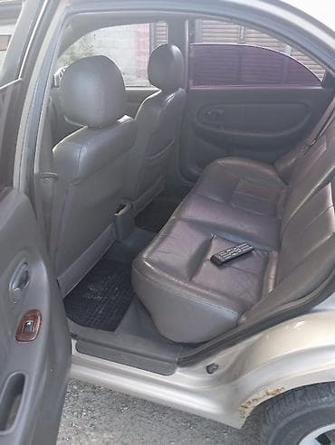 mini copper: Kia Spectra: 2002 г., 1.6 л, Автомат, Бензин, Седан — 5