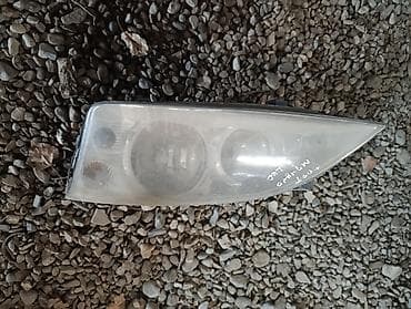 гольф 3 бампер: Передняя левая фара Ford — 1