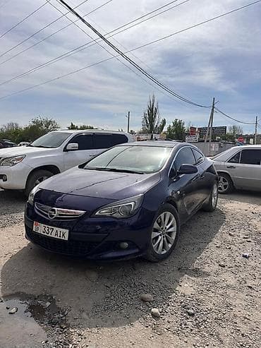 Opel Astra GTC: 2014 г., 1.8 л, Механика, Бензин, Купе