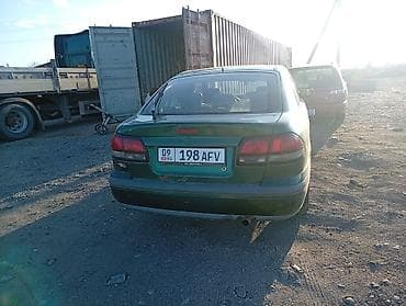 глушители выхлоп: Mazda 626: 1999 г., 2 л, Ручные, Бензин, Седан — 3