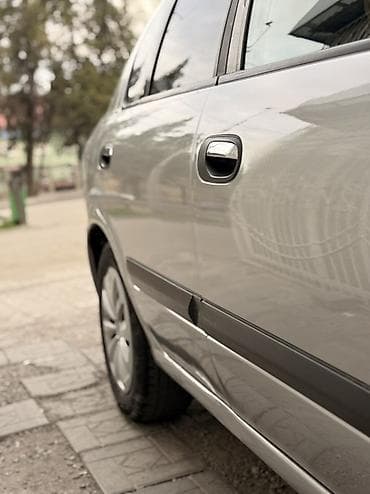 заднее крыло: Nissan Almera Tino: 2003 г., 1.8 л, Ручные, Газ, Хэтчбэк — 6