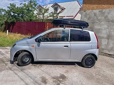 дайхатсу куеро: Daihatsu Cuore: 2005 г., 1 л, Механика, Бензин, Купе — 7