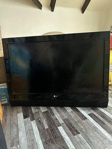 hidden camera: Телевизор LG Высота 75 Ширина 104 Панель с глянцевым экраном, черная — 1