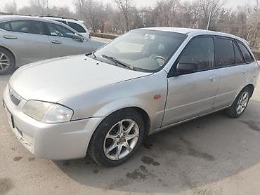 Транспорт: Mazda Familia: 1998 г., 1.5 л, Механика, Бензин, Хетчбек — 9
