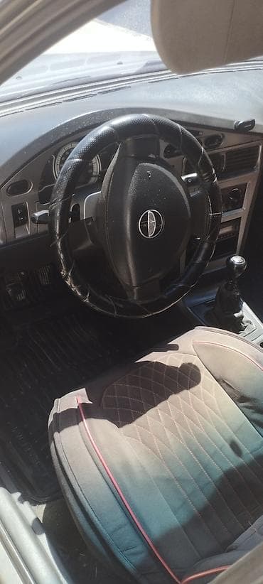 Унаа: Daewoo Nexia: 2008 г., 1.6 л, Кол менен иштөөчү, Газ, Седан — 6