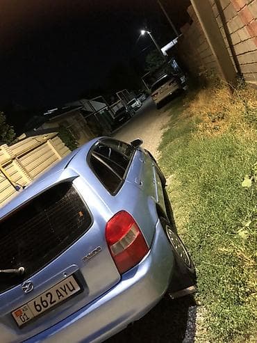 mini cooper: Mazda Familia: 2002 г., Универсал — 2