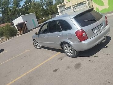 рейка на 210: Mazda 323: 2003 г., 1.5 л, Механика, Универсал — 4